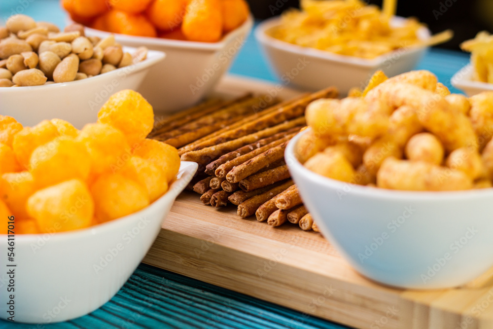 Salty snacks on the table ready to party Salty snacks on the table ready to party