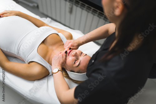 Quadro em tela Traditional face-lift massage concept