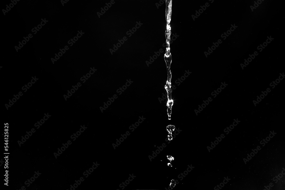 water splashes isolated on black background. white jets with drops water splashes isolated on black background. white jets with drops