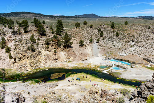 Aerial view of Hot Creek Geological Area with tourists exploring natural wonder near Mammoth Lakes California