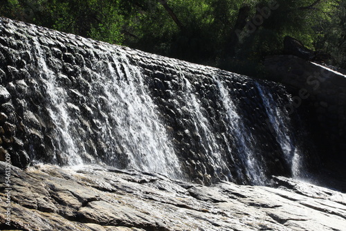 Waterfall on a man made reservoir spillway