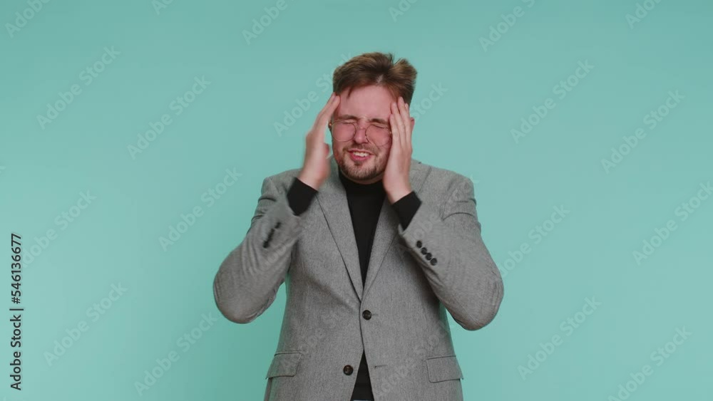 Sincere business man 20s years old wishing, waiting for good luck and loses becoming surprised sudden lottery results, bad news, fortune loss fail. Adult guy boy isolated alone on blue background Sincere business man 20s years old wishing, waiting for good luck and loses becoming surprised sudden lottery results, bad news, fortune loss fail. Adult guy boy isolated alone on blue background