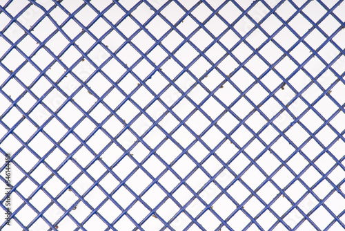 The texture in the form of a blue metal mesh. Macro