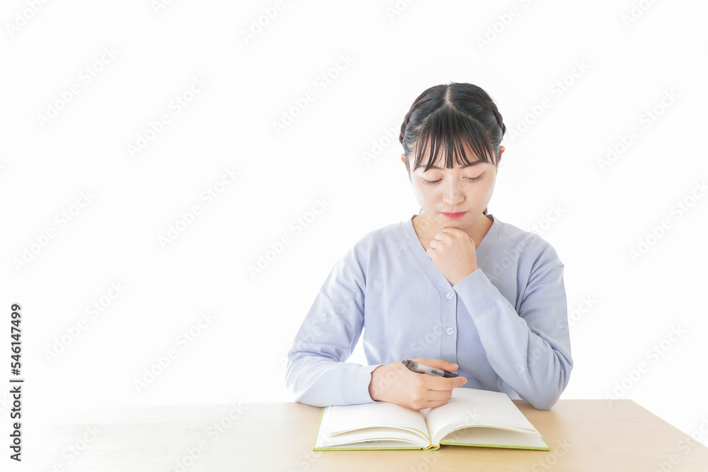 悩む若い女子学生 悩む若い女子学生