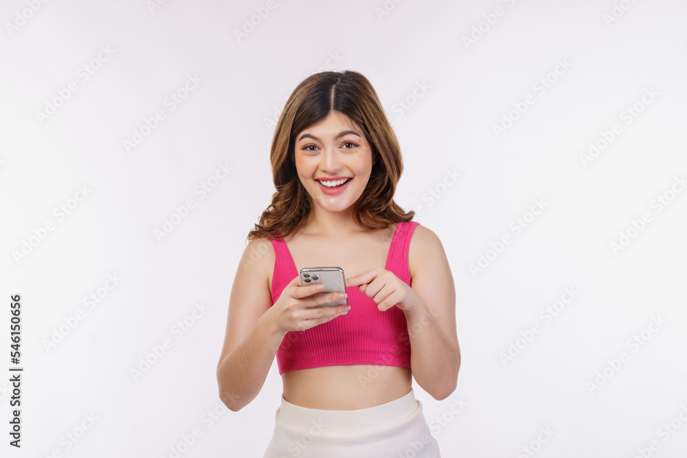 Portrait of happy smiling young woman using mobile phone isolated over white background Portrait of happy smiling young woman using mobile phone isolated over white background