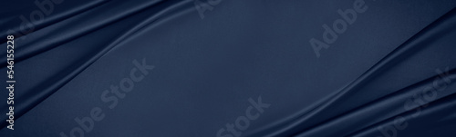 Obraz na płótnie Dark blue silk satin. Soft folds. Fabric. Navy blue luxury background. Space for design.Wavy lines.Banner. Wide.Long. Flat lay, top view table. Beautiful. Elegant. Birthday, Christmas, Valentine's Day w salonie