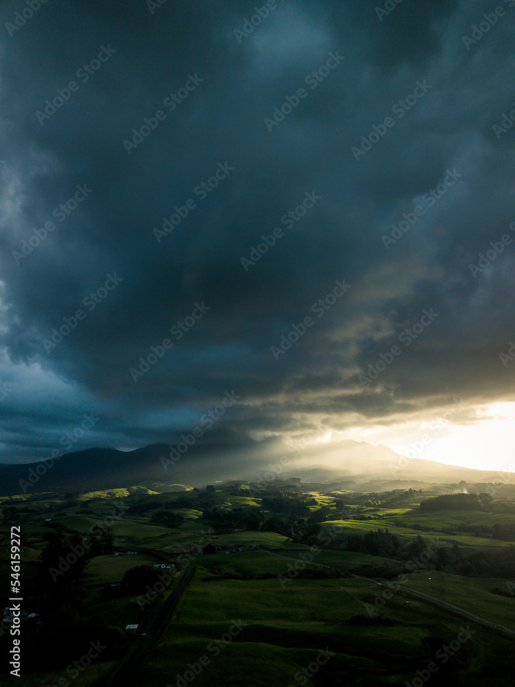 Moody sunset over farmland