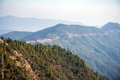 Panoramic view of windy road on the ridge of the mountains