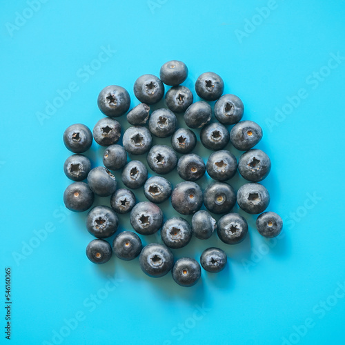 Fresh blueberry on blue background