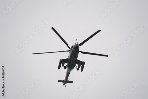 Almaty, Kazakhstan - 04.14.2022 : A military helicopter flies over the training ground during an exercise.