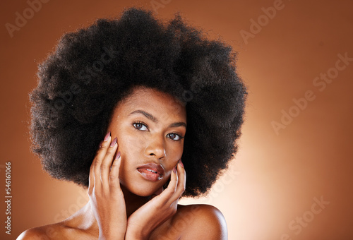 Black woman, afro hair or skincare face glow on studio background for dermatology wellness, cosmetology routine or hair care. Portrait, natural hair or beauty model with makeup cosmetics in self love