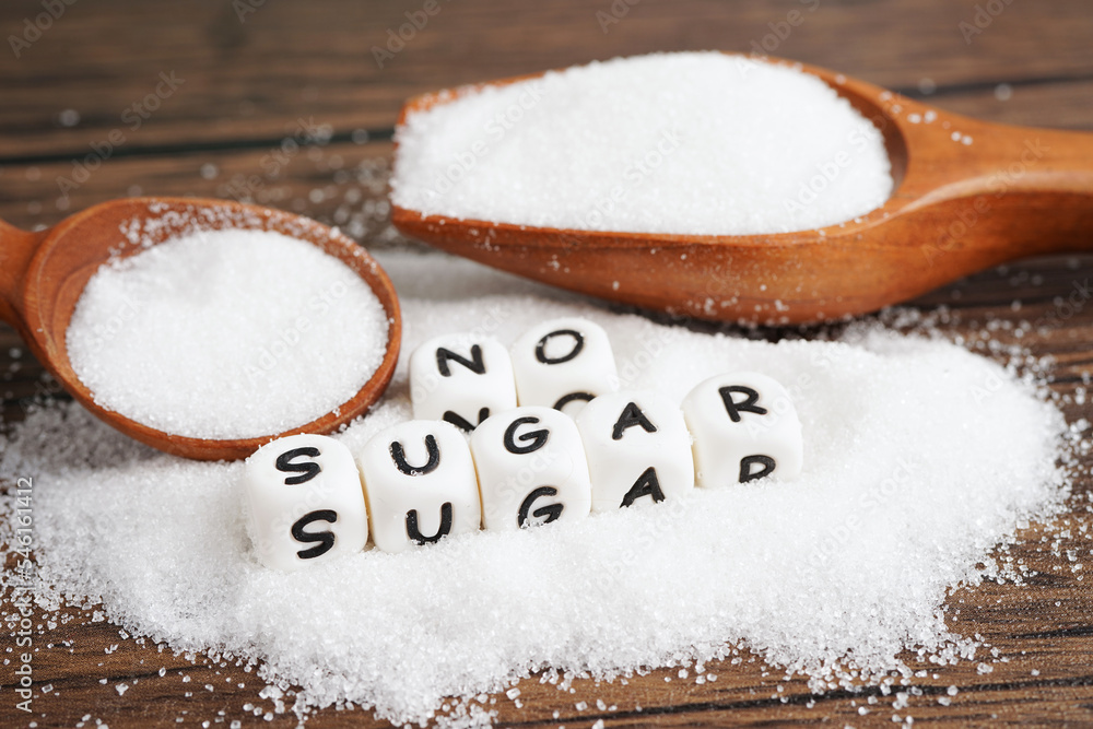 No sugar, sweet granulated sugar with text, diabetes prevention, diet and weight loss for good health. No sugar, sweet granulated sugar with text, diabetes prevention, diet and weight loss for good health.