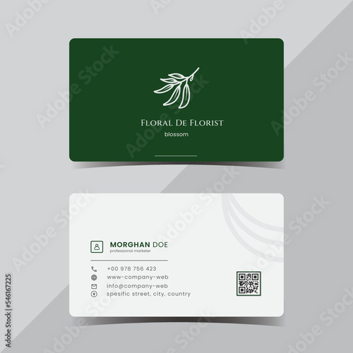 professional green business card design template, with botanical floral logo