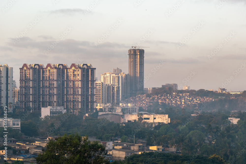A cityscape skyline of high rise skyscrapers in the suburb of Kandivali in the city of Mumbai.