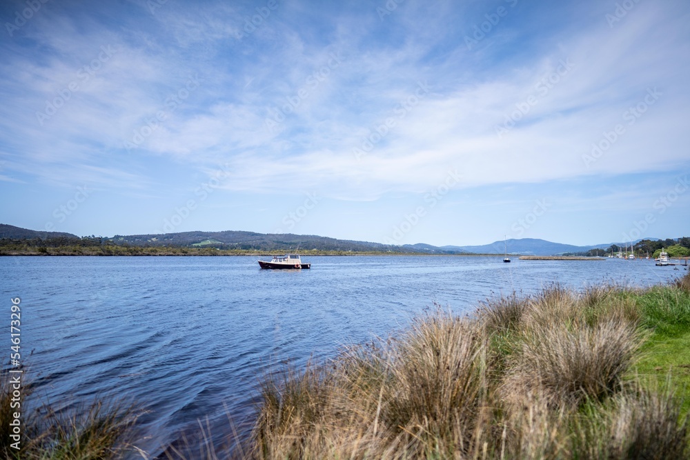 boats on a river in tasmania australia