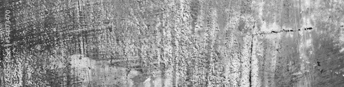 Black white grunge texture. Old scratched metal. Damaged gray steel background with copy space for design. Web banner. Website header. Panoramic. 