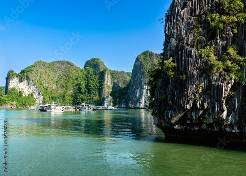 View of Ha Long bay Ha Long Bay landscape with passenger ships anchored in Quang Ninh province, Vietnam.