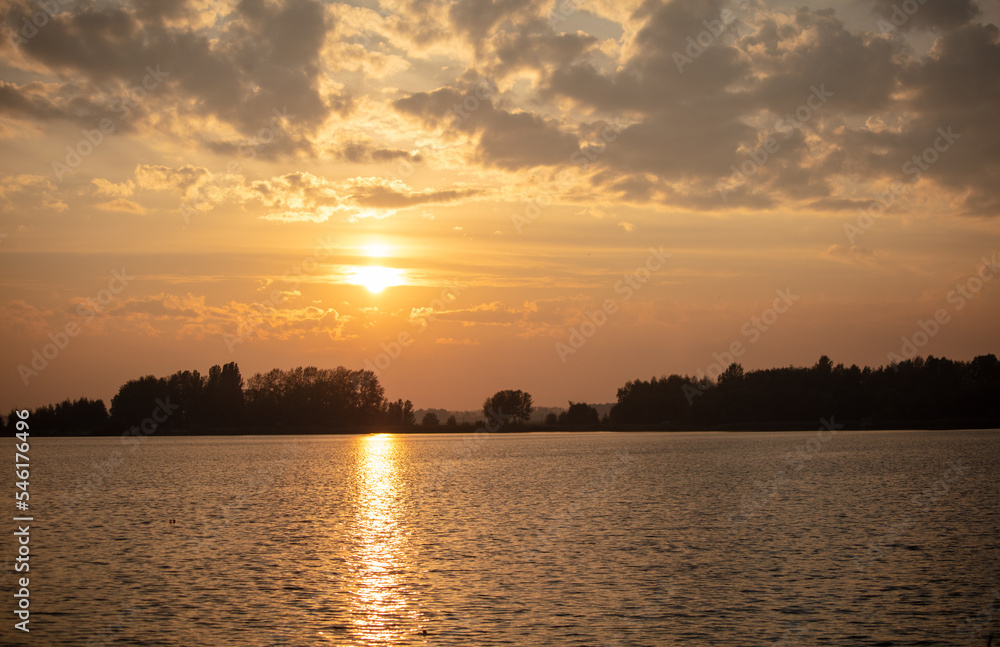 Golden sunset on the lake.