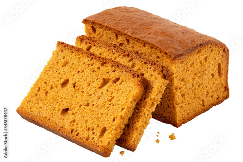 Two slices of spiced honey cake next to a loaf of honey cake isolated.
