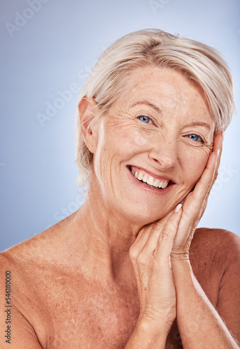Senior woman, skincare and happy with cosmetics, health and wellness of face beauty against a grey studio background with mockup. Elderly model, portrait and skin makeup, cosmetic and healthy smile
