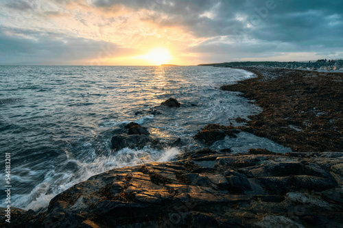 Beautiful seascape sunset scenery of rocky coast at wild atlantic way, Salthill beach, Galway, Ireland 