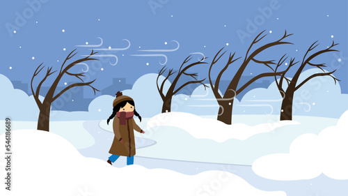 lonely girl in a cold park in winter