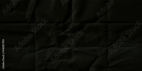 Black crumpled paper texture background. Clean black paper. Top view.