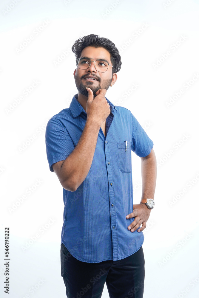 solution of problem. young cute man disposes of a problem. looks up, makes up an idea. isolated white background solution of problem. young cute man disposes of a problem. looks up, makes up an idea. isolated white background