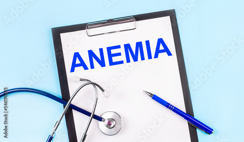 Wallpaper Mural On a blue background, a stethoscope, a pen and a tablet with paper and the text ANEMIA. Medical concept Torontodigital.ca