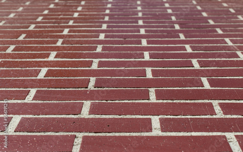 Selective focus of the red ceramic brick wall. order and alignment. selective focus, copy space.