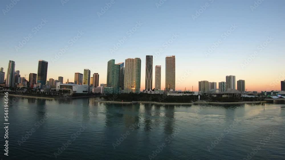 Modern architecture cityscape, skyline of a city with bay in front panoramic video background Modern architecture cityscape, skyline of a city with bay in front panoramic video background