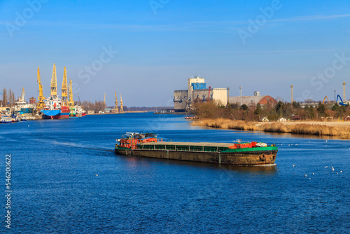 Canvas Print Barge sailing on the Oder river in Szczecin, Poland