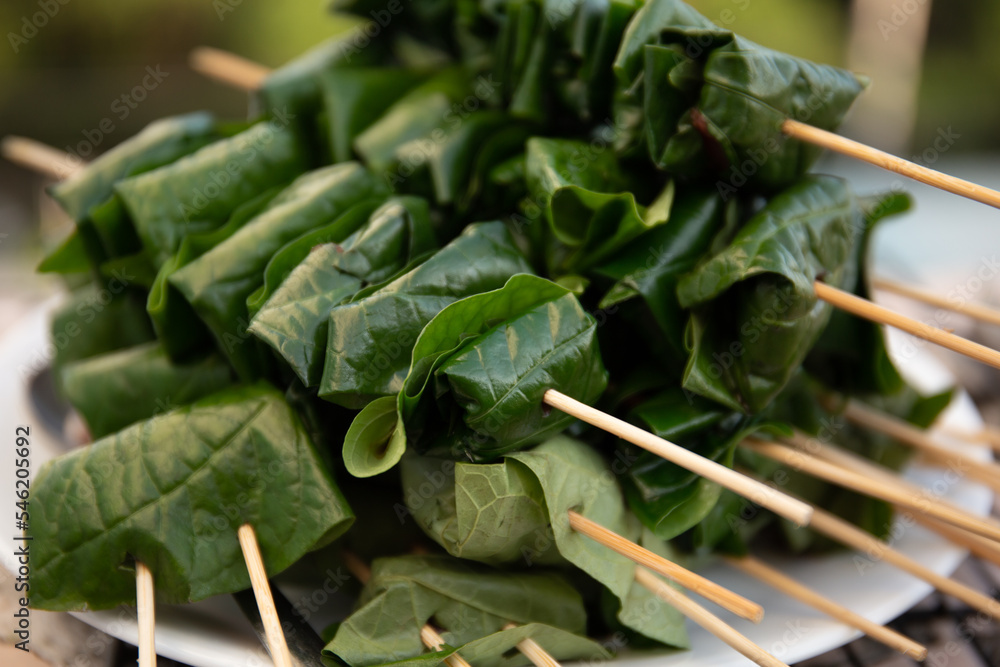 grilled minced beef wrapped in betel leaf, vietnamese cuisine, thit bo