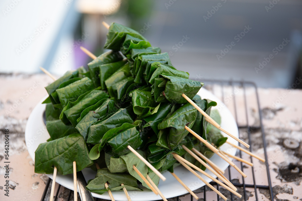 grilled minced beef wrapped in betel leaf, vietnamese cuisine, thit bo