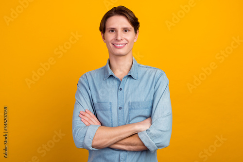 Photo of good looking smart guy crossing arms ready for work decisions isolated shine vivid color background