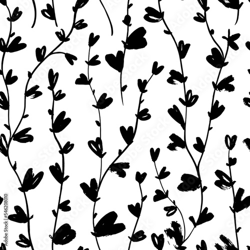 Curved thin branches with small leaves seamless pattern. Heart shape leaves on vertical liana stems. Botanical stylish background with brush drawn vector plants. Hand drawn foliage black silhouettes.