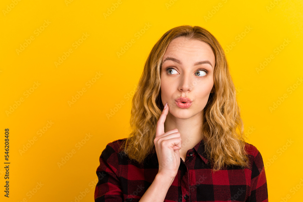 Photo of lady looking up empty space deep thinking creative arm on chin isolated yellow color background Photo of lady looking up empty space deep thinking creative arm on chin isolated yellow color background