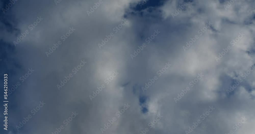 A beautiful hyperlapse of moving and changing clouds of different shapes against the blue sky. Timelapse of fast movement of white, gray and blue clouds. A beautiful hyperlapse of moving and changing clouds of different shapes against the blue sky. Timelapse of fast movement of white, gray and blue clouds.