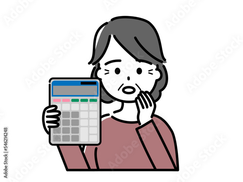 計算機を持って困っている高齢女性