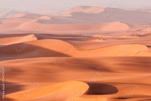View over the rolling sanddunes in the Namib desert in the vicinity of Swakopmund, Namibië at sunrise  © Chris