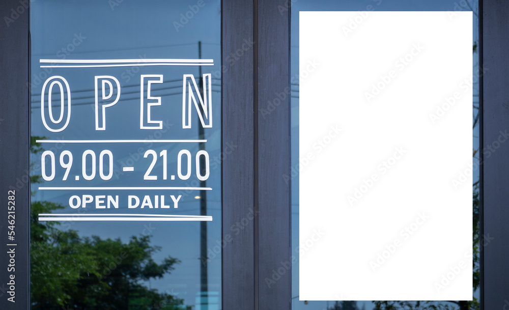 Obraz premium Open sign broad through the glass of door in cafe and copy space for text advertising