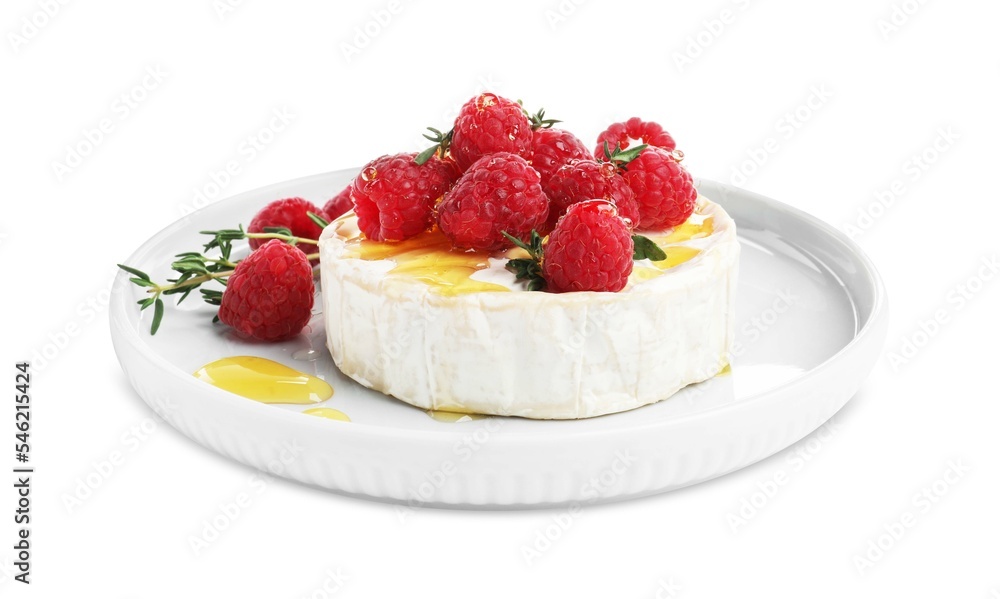 Brie cheese served with raspberries and honey isolated on white Brie cheese served with raspberries and honey isolated on white