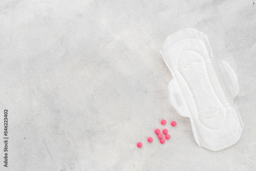 Menstrual cycle and protection concept with white pad, top view Menstrual cycle and protection concept with white pad, top view
