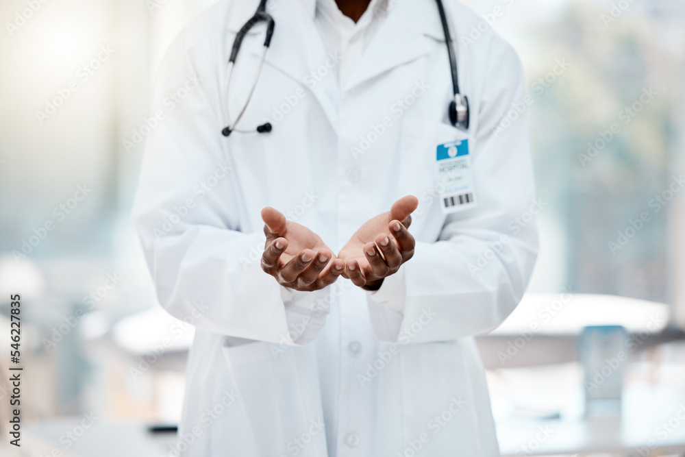 Doctor, hands and open in hospital for help, healthcare or medical support with welcome, care and trust. Black doctor, medic man and health worker in clinic, empty palm and stethoscope in workplace Doctor, hands and open in hospital for help, healthcare or medical support with welcome, care and trust. Black doctor, medic man and health worker in clinic, empty palm and stethoscope in workplace