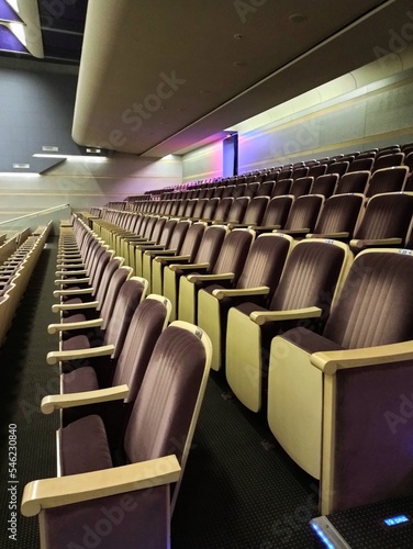 empty hall with purple chairs