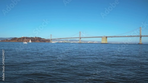 San Francisco, CA, USA - September 3, 2022: The Bay Bridge and Yerbabuena Island seen from Pier 7 Vista photo