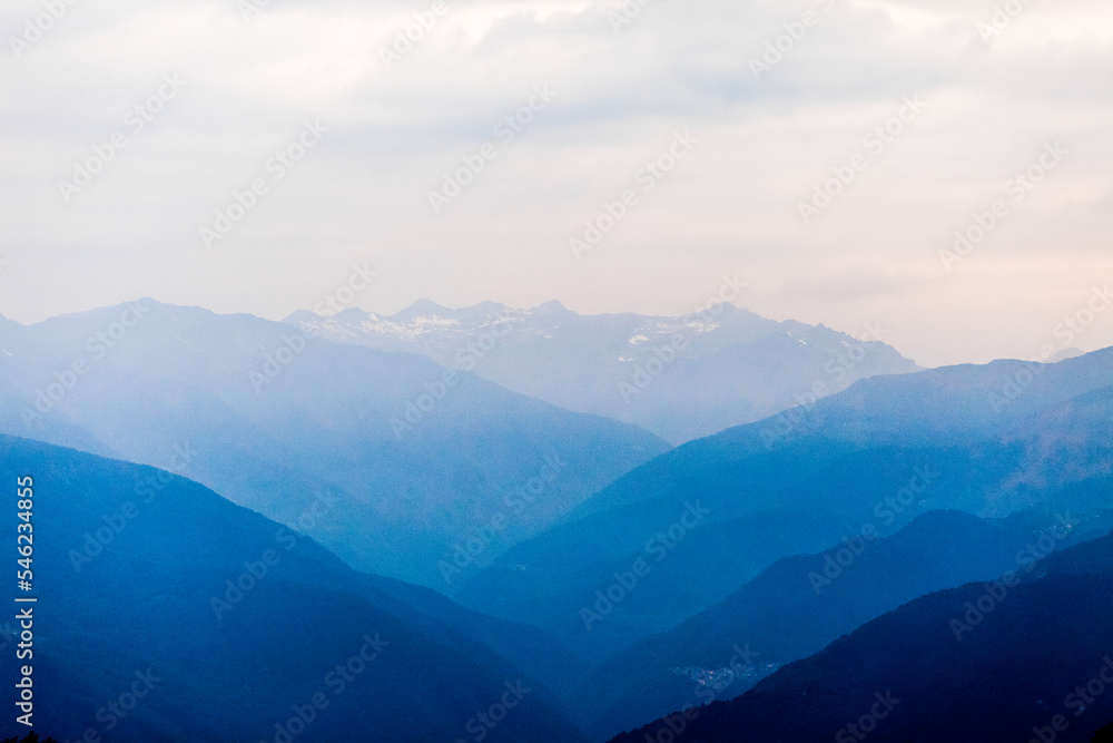 Blue hills in the Alps mountains in Italy