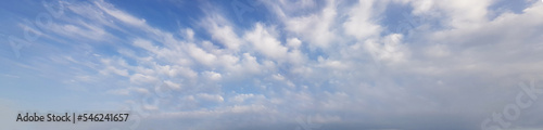 White clouds formation in blue sky panorama