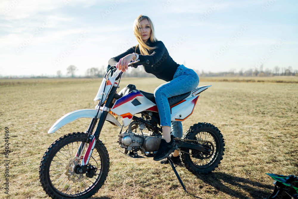 Girl riding motorbike best sale