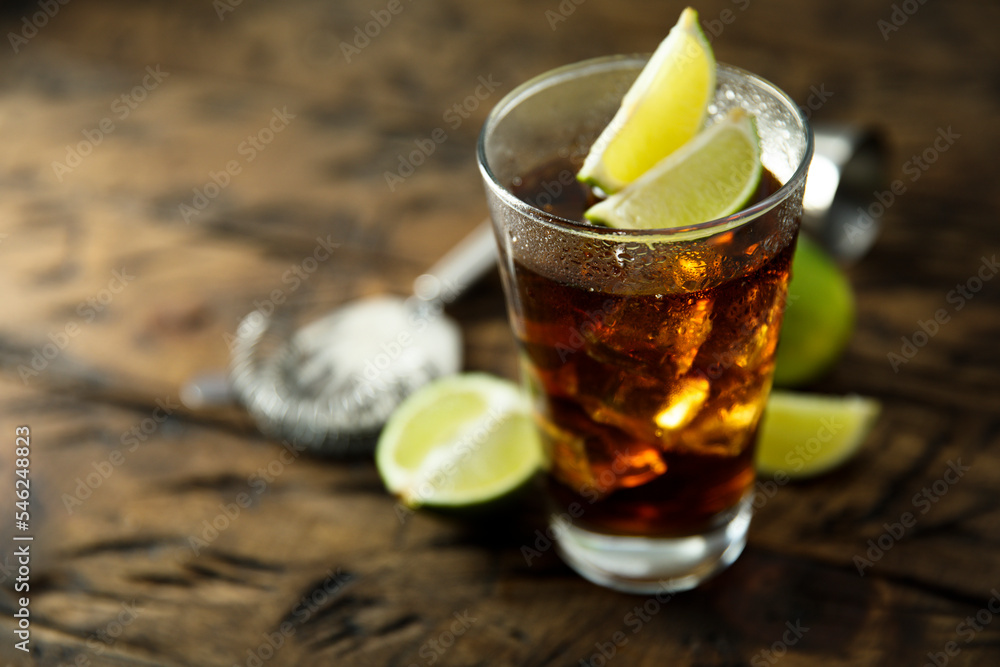 Homemade iced tea cocktail with lime Homemade iced tea cocktail with lime
